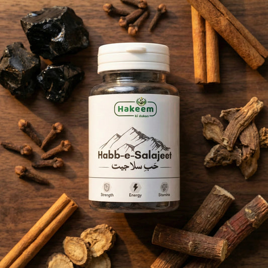 Bottle of Hakeem Habb-e-Salajeet with spices on a wooden surface